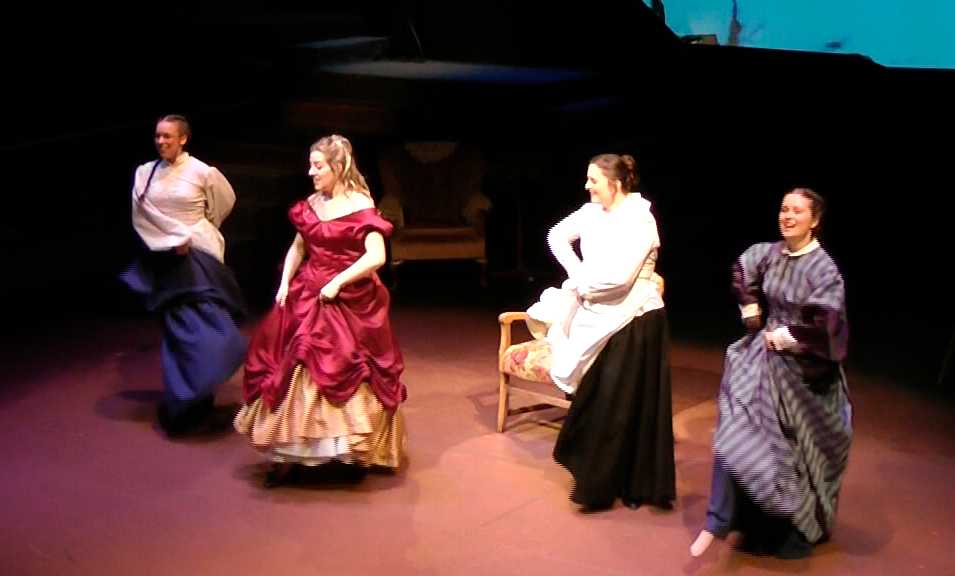 Four women dancing